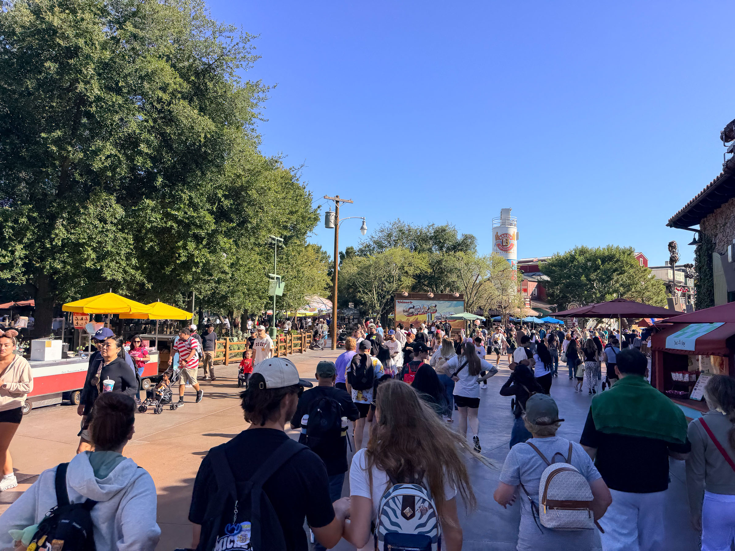 Packed midday walkway at Disneyland