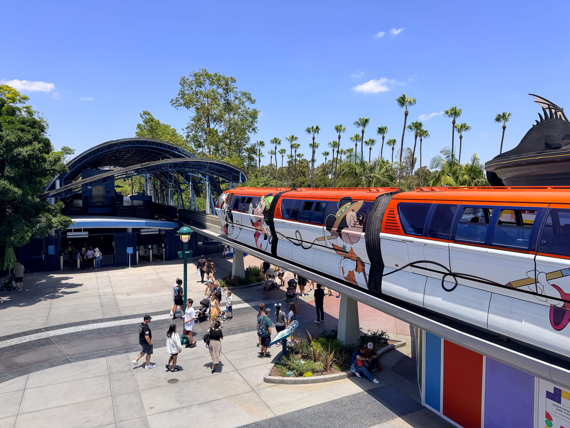 Monorail gliding over the Downtown Disney plaza