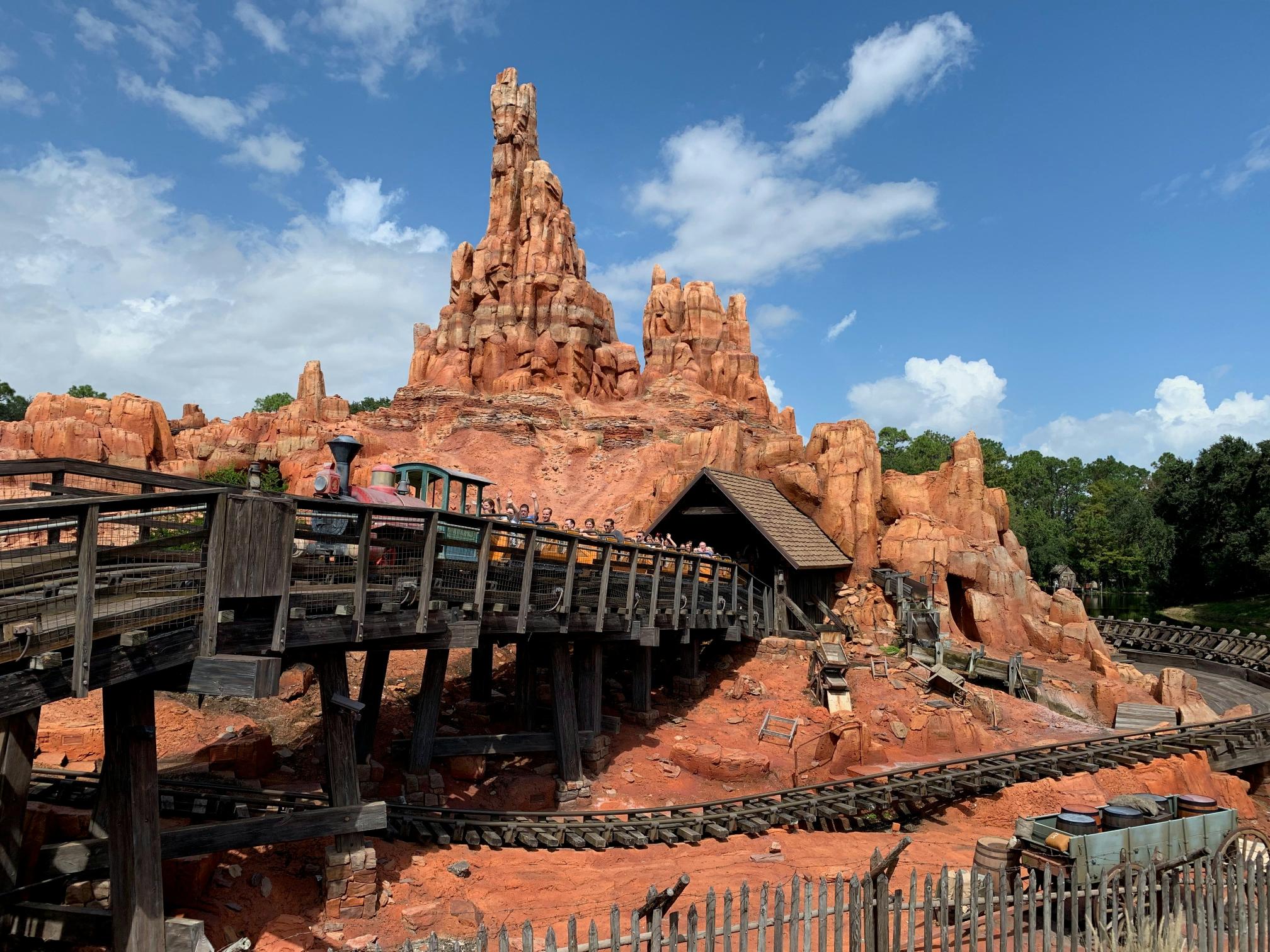 Big Thunder Mountain Railroad at Walt Disney World with the red rocky terrain and train visible.